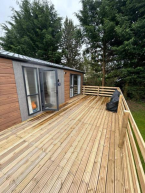 Corrie Fee Lodge Boat of Garten sleeps 4 pet friendly large deck